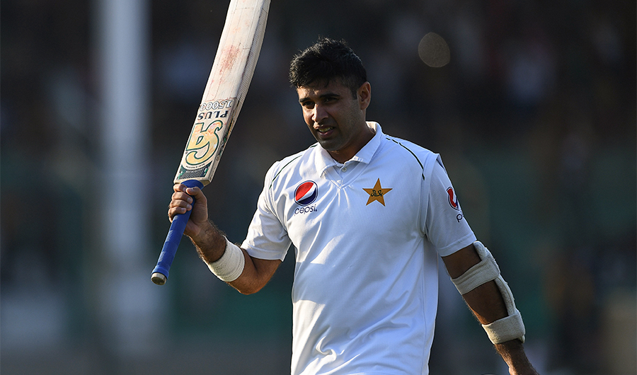Pakistan's Abid Ali acknowledges the crowed as he walks back to pavilion after his dismissal for 174 runs during the third day of the second Test cricket match between Pakistan and Sri Lanka at the National Cricket Stadium in Karachi on December 21, 2019. (AFP)