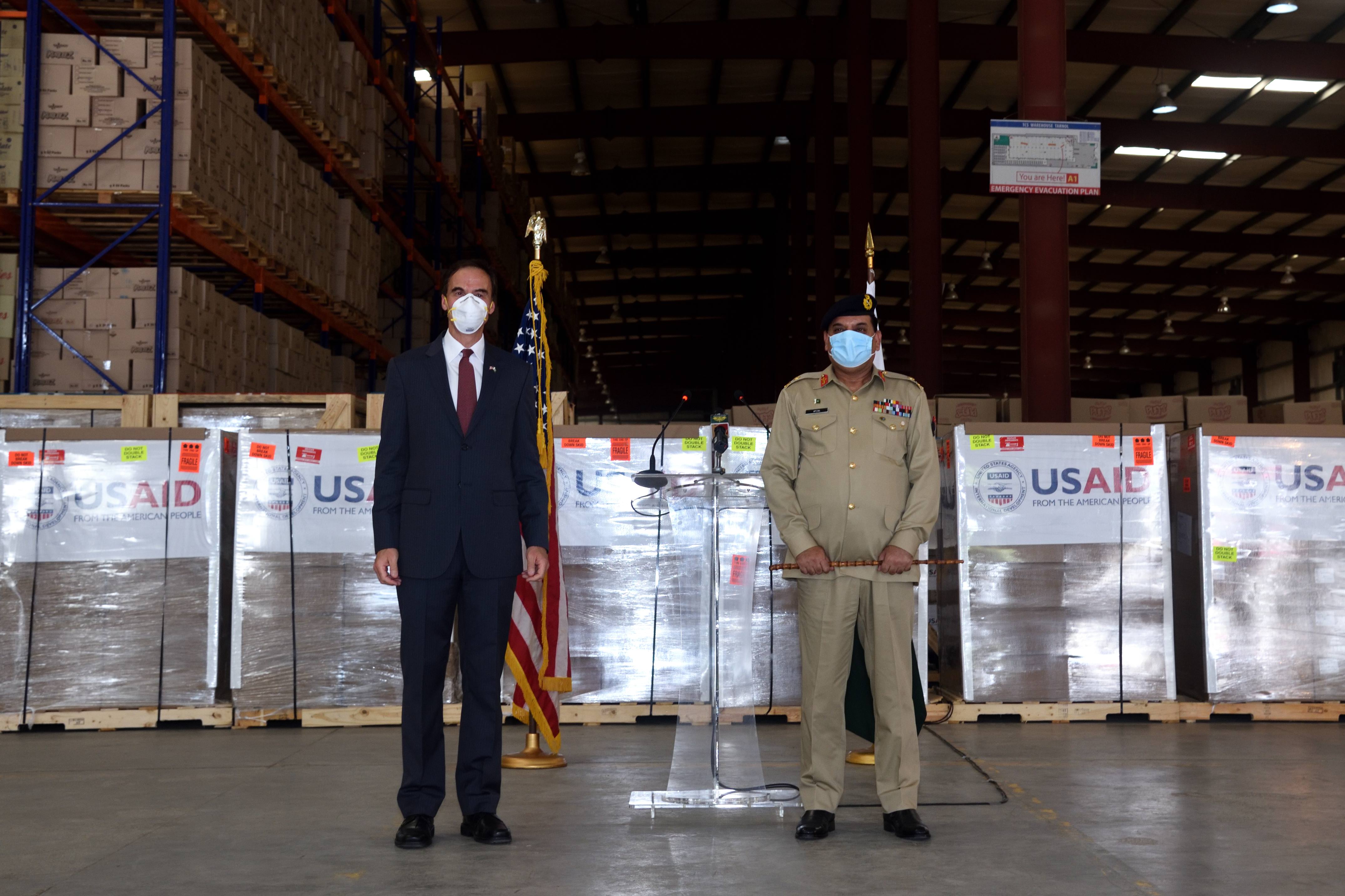US Ambassador to Pakistan Paul W. Jones poses with the chief of Pakistan’s National Disaster Management Authority, Lt. Gen. Muhammad Afzal, in Islamabad, Pakistan, on July 28, 2020. (Photo courtesy: US Embassy)