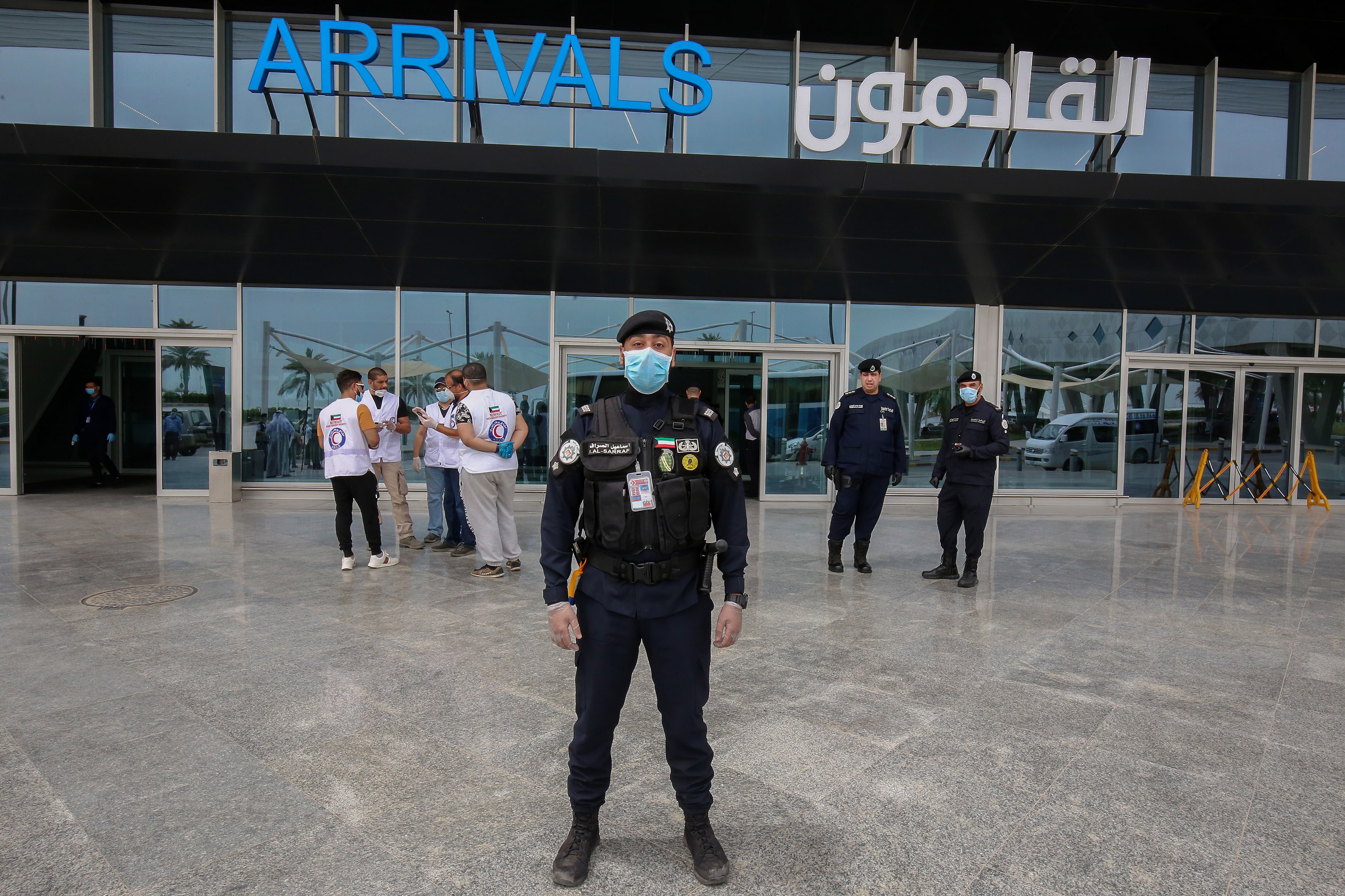 Kuwaiti police officer poses for a picture outside Kuwait international airport in Kuwait City on April 19, 2020 during the COVID-19 coronavirus pandemic. (AFP/ File photo)