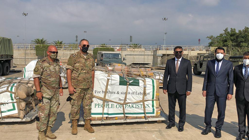 Pakistan’s Ambassador to Lebanon Najeeb Durrani is handing over eight tons of relief items for the victims of Beirut explosions to senior Lebanese officials at the Rafic Hariri International Airport in Beirut on Aug. 7, 2020. (Photo courtesy Pakistan Embassy in Beirut)