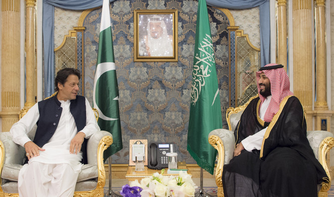 Saudi Crown Prince Mohammed bin Salman (R) meets with Pakistani Prime Minister Imran Khan in Jeddah on September 19, 2018. (Saudi Ministry of Media handout via AFP/File photo)
