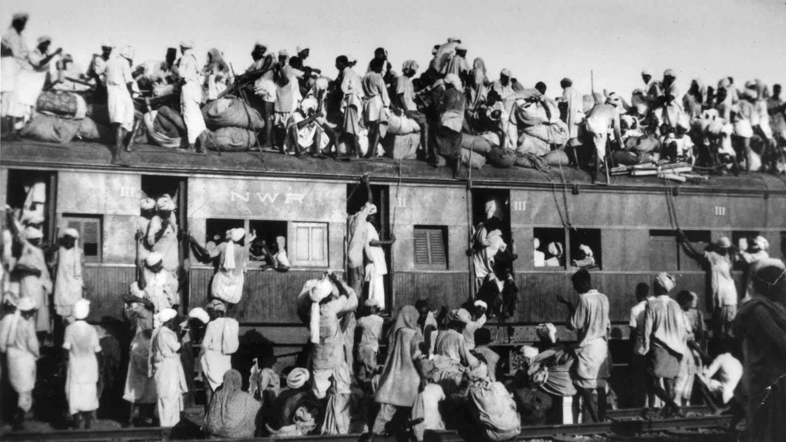 In this Sept. 1947, file photo, hundreds of Muslim refugees crowd on top of a train leaving New Delhi for Pakistan. (AP/File)