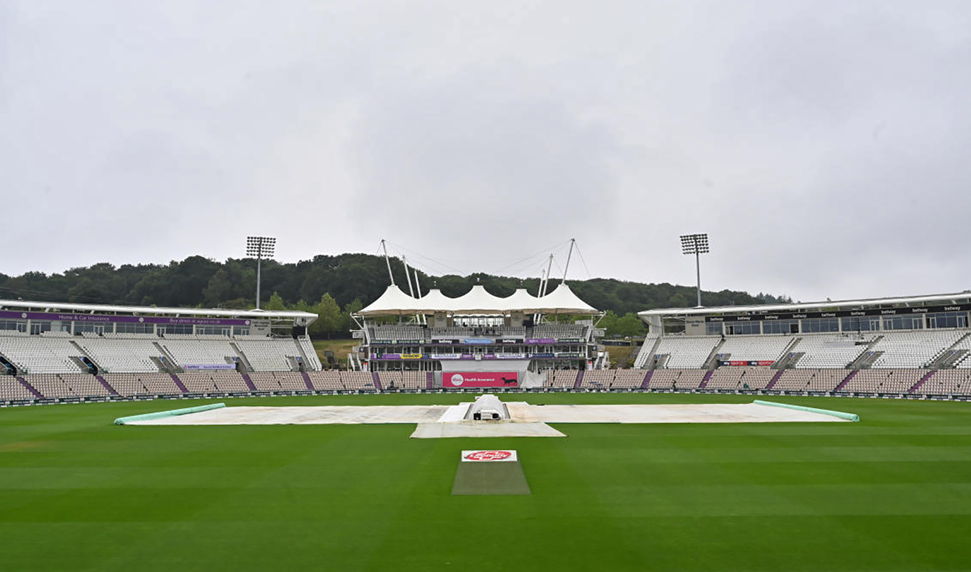 General view of covers on the pitch as rain delays the start of the third day of second test between England and Pakistan on Aug. 15, 2020. (Pool via REUTERS)