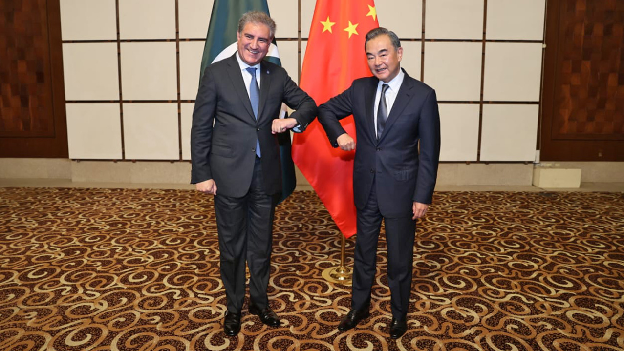 In this photo released by the Pakistani Foreign Office, Pakistani Foreign Minister Shah Mahmood Qureshi and his Chinese counterpart, Wang Yi, meet in China's Hainan province to holding the second round of the China-Pakistan foreign ministers' strategic dialogue on Friday, Aug. 21, 2020. (Photo courtesy of Foreign Office via AN)