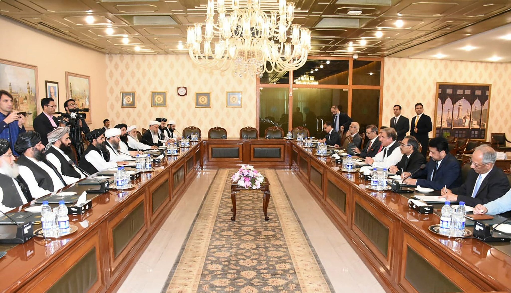 Pakistan's foreign minister Shah Mahmood Qureshi, fourth right, holds a meeting with Afghan Taliban delegation at the Foreign Ministry in Islamabad on Oct. 3, 2019. (Ministry of Foreign Affairs of Pakistan via AN)