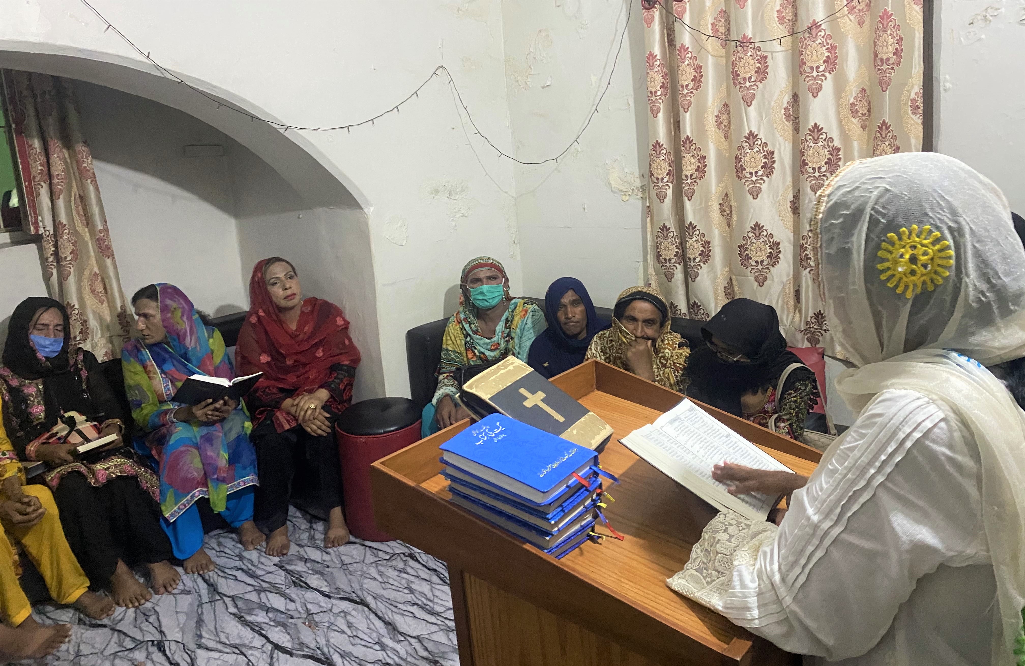 Pastor Ghazala Shafiq reads the Bible at a small church set up at her residence for transgender Christians, in Karachi, Pakistan, on August 21, 2020. (AN Photo)
