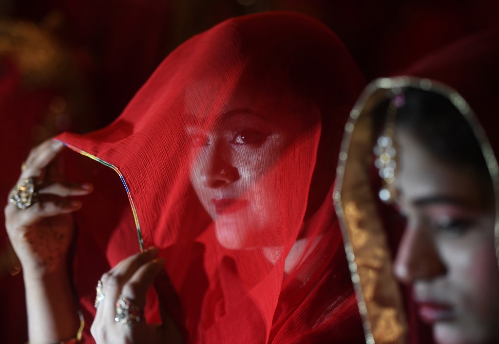 A Pakistani bride looks on at a wedding ceremony in Karachi on April 13, 2019. The Pakistani Supreme Court said in an order released on Wednesday, Aug. 26, 2020, that approval of the first wife and an arbitration council was mandatory for a man to enter into a second marriage. (AFP/File)