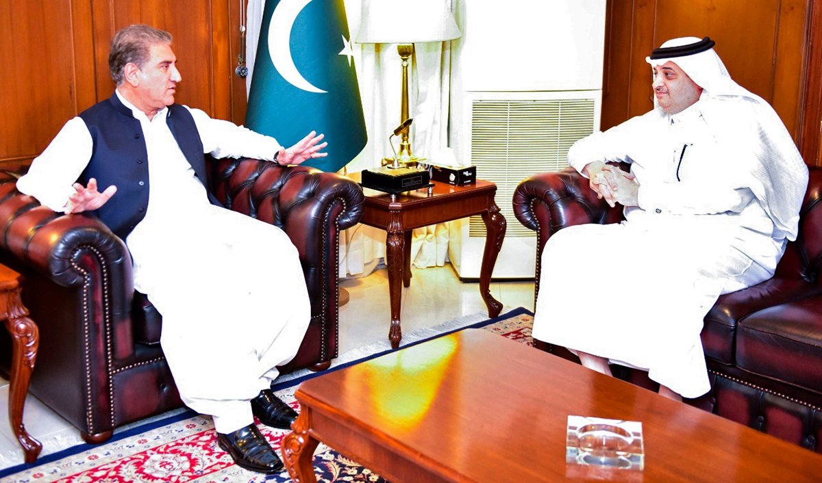 Pakistan's Foreign Minister Shah Mahmood Qureshi, left, during a meeting with Saudi Ambassador Nawaf bin Said Al-Malki in Islamabad on Aug. 31, 2020. (Photo courtesy: Ministry of Foreign Affairs Pakistan)