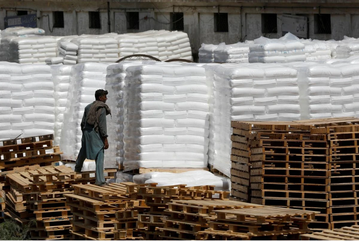 A laborer stands near the cargo supply at a warehouse near the port area in Karachi, Pakistan May 13, 2020. (REUTERS/ File Photo)