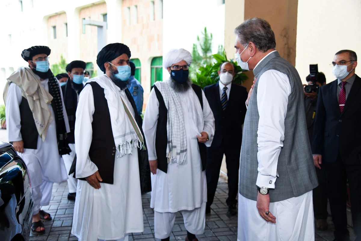 The photograph released by Pakistan's Ministry of Foreign Affairs shows Foreign Minister Shah Mahmood Qureshi, front, receiving Afghan Taliban delegation at the foreign office in Islamabad on Aug. 25, 2020. (Pakistan's Ministry of Foreign Affairs via AN)