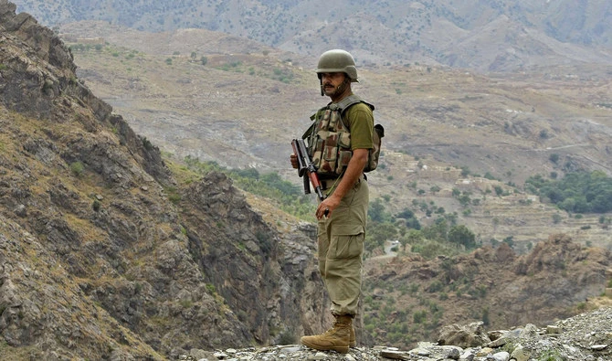 In this file photo, a Pakistani army soldier stands guard near Torkham border post between Pakistan and Afghanistan on June 15, 2016. (AP)
