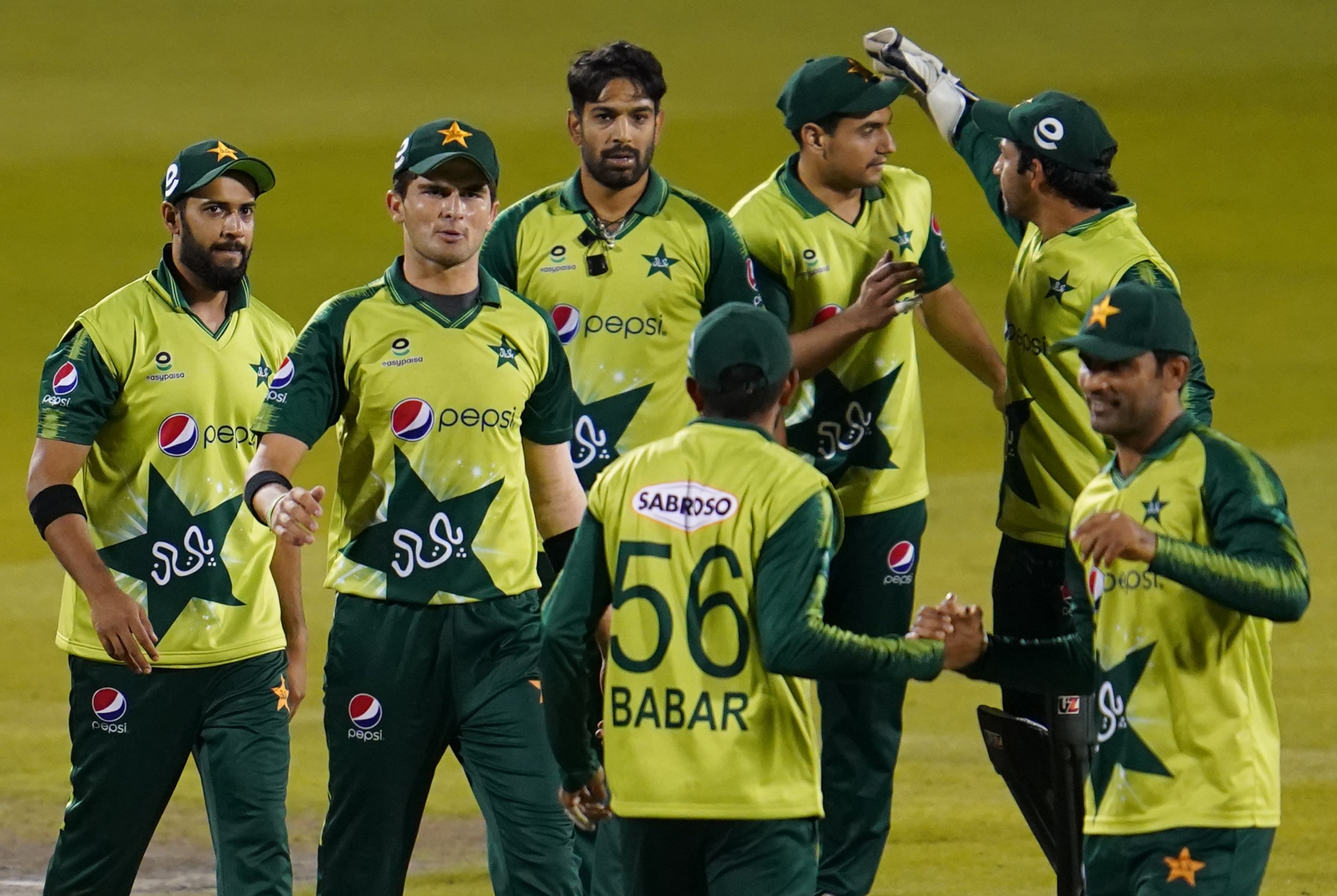 Pakistan players celebrate winning by five runs after the international Twenty20 cricket match between England and Pakistan at Old Trafford cricket ground in Manchester, north-west England, on September 1, 2020. (AFP)