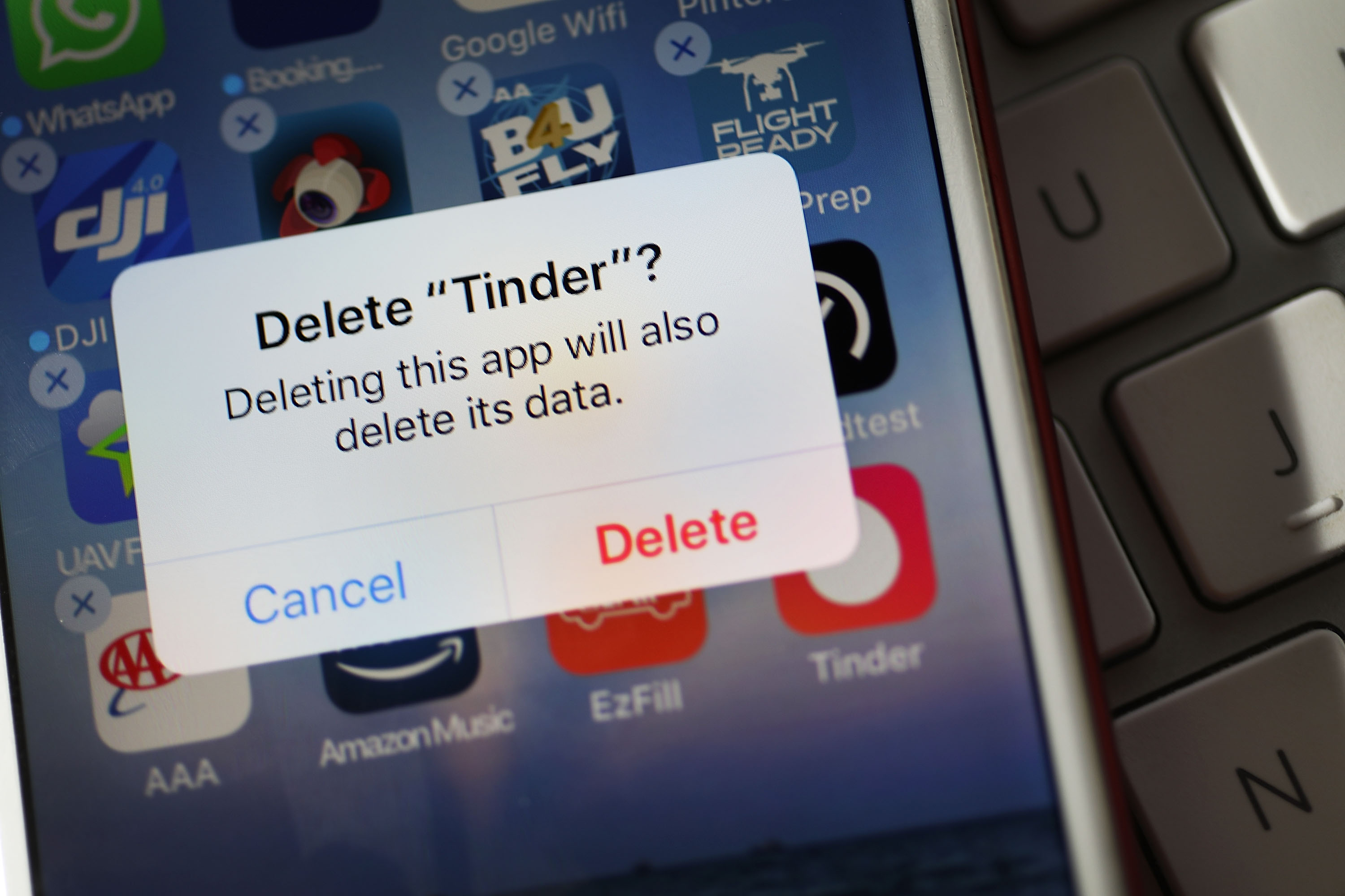 : In this photo illustration, the icon for the dating app Tinder is seen on the screen of an iPhone on August 14, 2018 in Miami, Florida. (AFP)