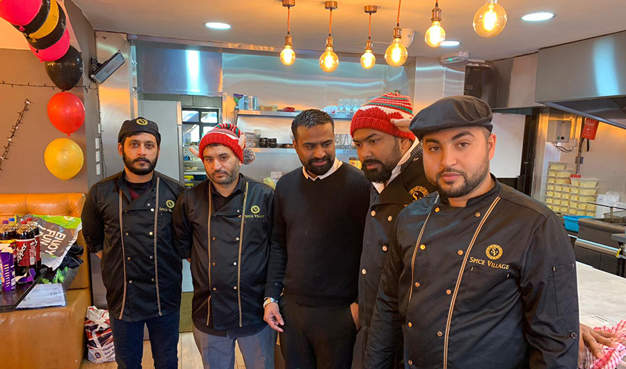 In this December 25, 2019 picture, employees of Spice Village restaurants serve meals to homeless and other vulnerable communities during their “No One Eats Alone” food initiative in London, United Kingdom, on December 25, 2019. (Photo courtesy: Suleman Raza)