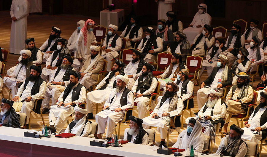 Members of the Taliban delegation attend the opening session of the peace talks between the Afghan government and the Taliban in the Qatari capital Doha on September 12, 2020. (AFP)