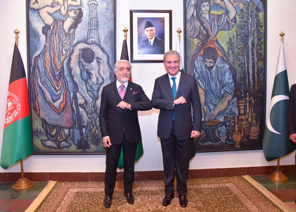 Afghanistan’s top peace negotiator Dr. Abdullah Abdullah poses with Pakistan's Foreign Minister Shah Mehmood Qureshi in Islamabad on September 28, 2020. (Photo Courtesy: Pakistan's Foreign Office)