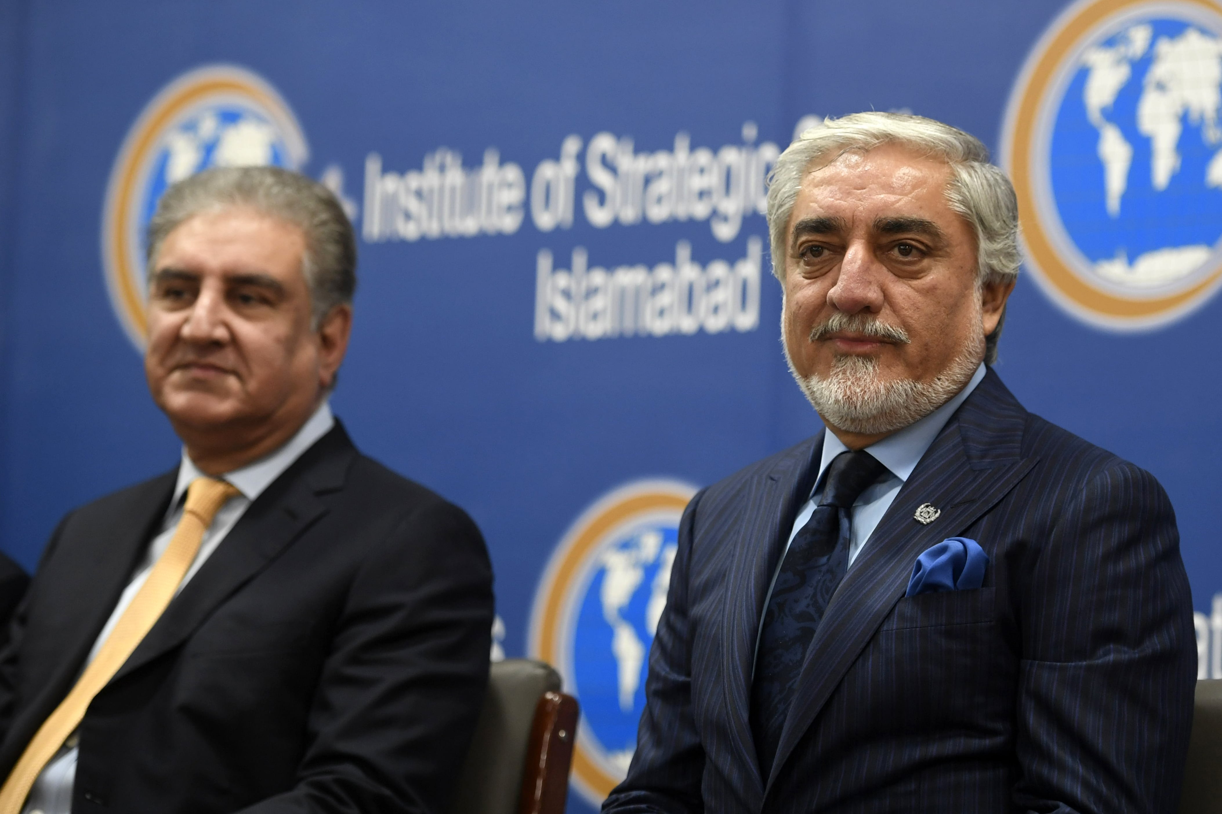 Chairman of the High Council for National Reconciliation of Afghanistan Abdullah Abdullah (R) and Pakistan's Foreign Minister Shah Mahmood Qureshi attend an event at the Institute of Strategic Studies, in Islamabad on September 29, 2020. (AFP)