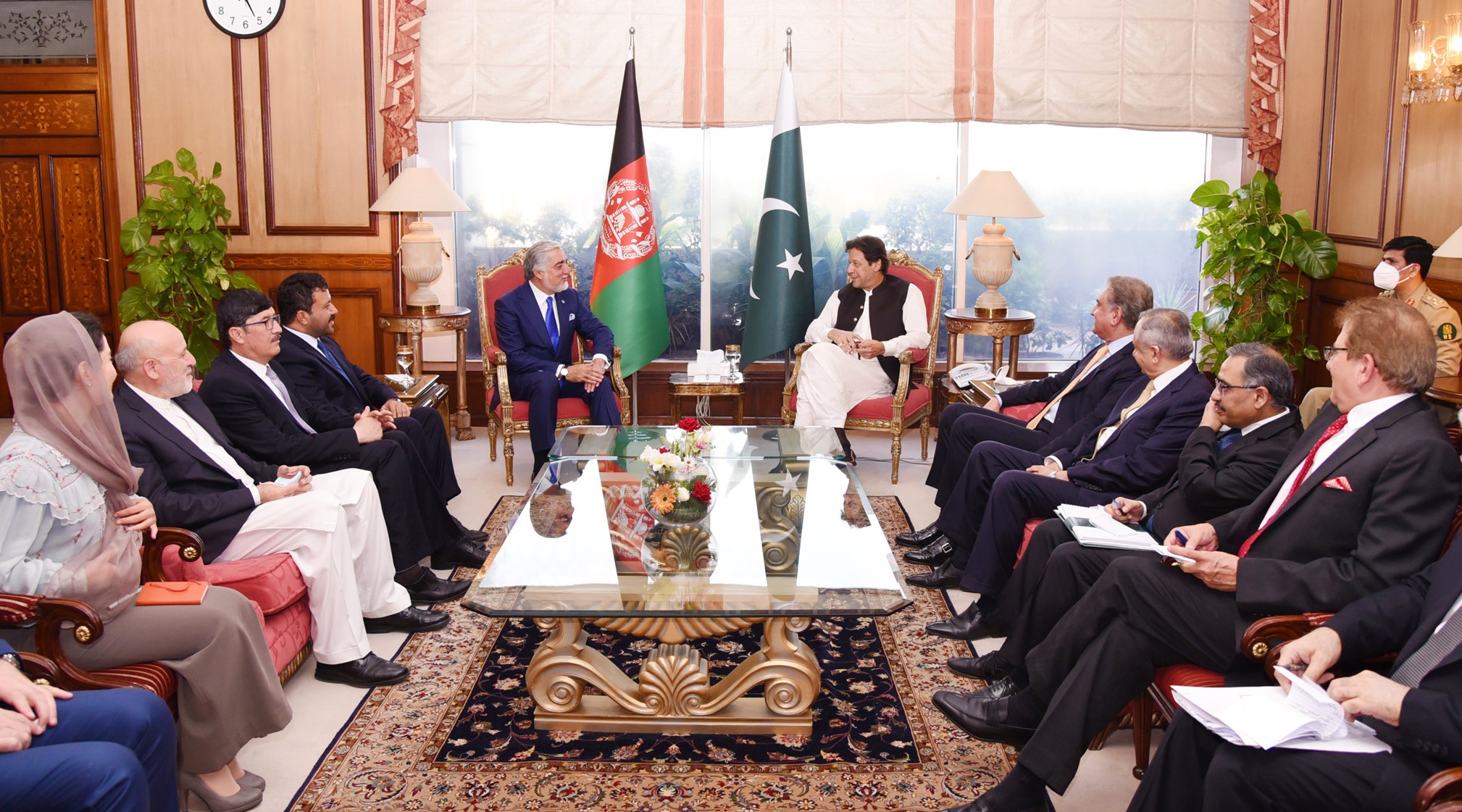 In this photo provided by Press Information Department, Abdullah Abdullah, left, chairman of Afghanistan's High Council for National Reconciliation, meets with Pakistan Prime Minister Imran Khan, in Islamabad on Sept. 29, 2020. (PID)