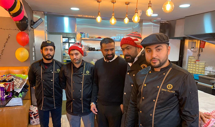 In this December 25, 2019 picture, employees of Spice Village restaurants serve meals to homeless and other vulnerable communities during their “No One Eats Alone” food initiative in London, United Kingdom, on December 25, 2019. (Photo courtesy: Suleman Raza)