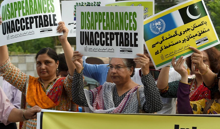 In this file photo, Pakistani human rights activists carry placards during a protest for missing persons to mark the International Day of the Victims of Enforced Disappearances in Lahore on August 30, 2016. (File/ AFP)