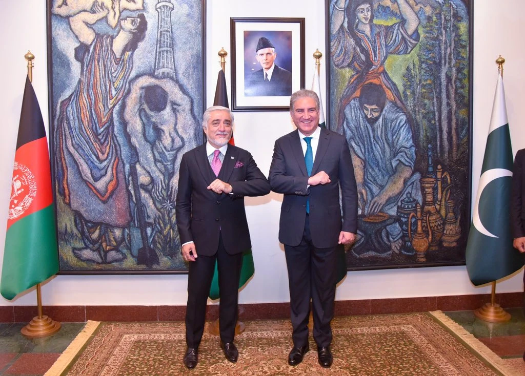 Afghanistan’s top peace negotiator Dr. Abdullah Abdullah poses with Pakistan's Foreign Minister Shah Mehmood Qureshi in Islamabad on September 28, 2020. (Photo Courtesy: Pakistan's Foreign Office)