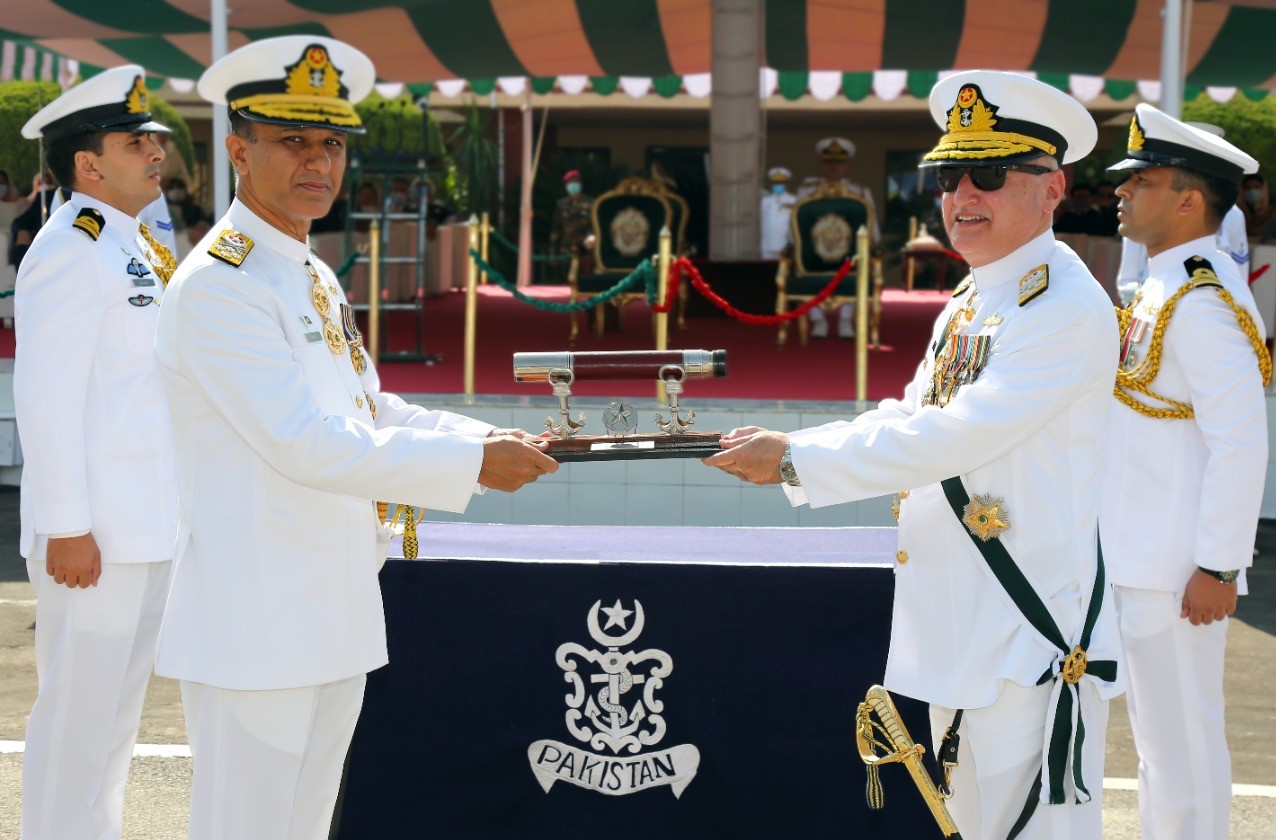 Admiral Zafar Mahmood Abbasi presenting the traditional Command Scroll to newly appointed Chief of the Naval Staff, Admiral Muhammad Amjad Khan Niazi during an impressive Change of Command Ceremony at PNS ZAFAR, Islamabad on October 7, 2020. (Photo courtesy: Pakistan Navy)