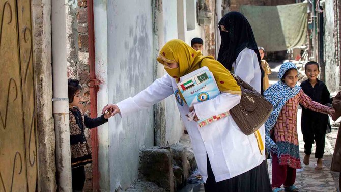 A female health worker is taking part in a door-to-door vaccination campaign by the UAE-Pakistan Assistance Program. (WAM)