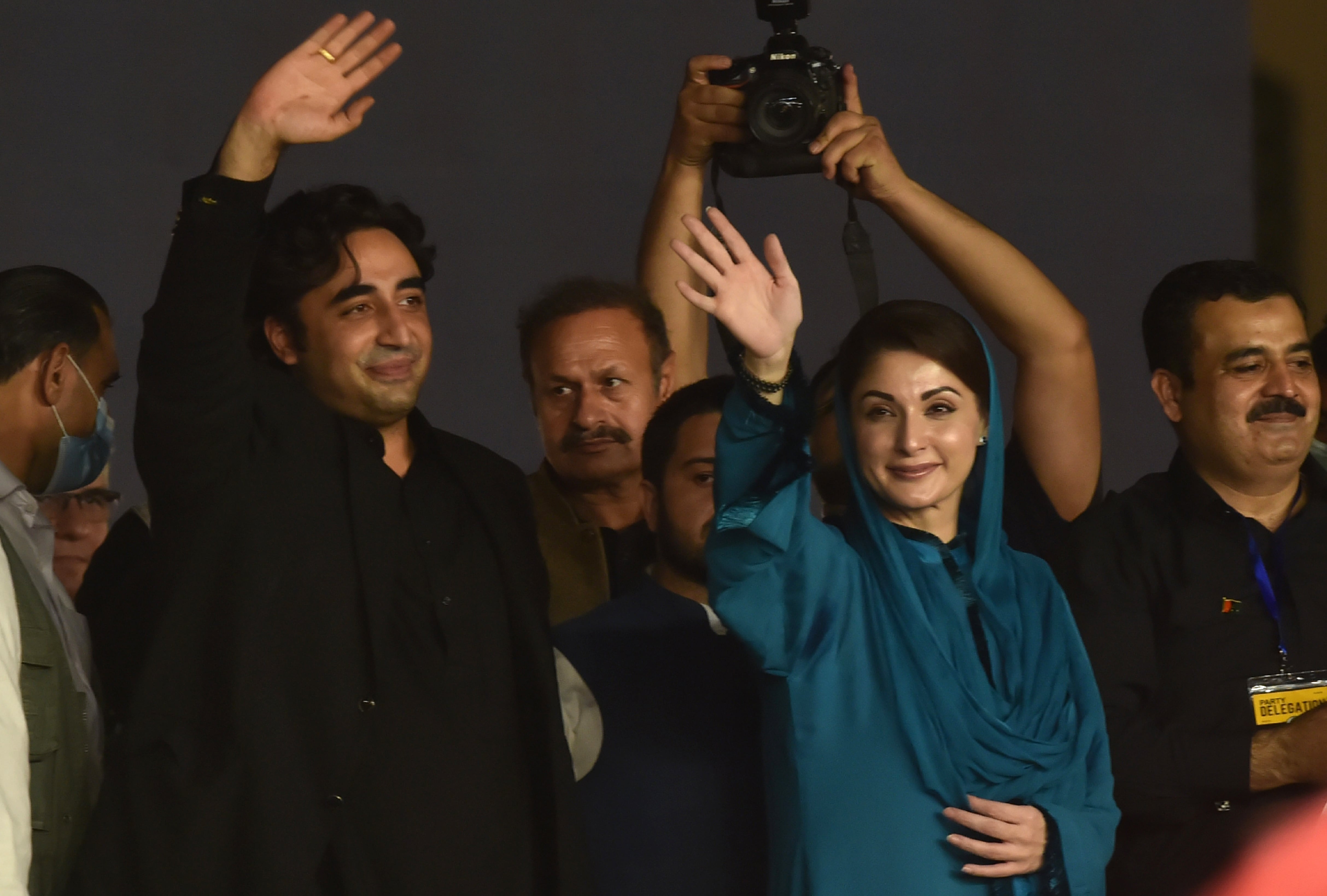 Leader of the newly-formed Pakistan Democratic Movement (PDM), an opposition alliance of 11 parties, Bilawal Bhutto Zardari (L) chairman of the Pakistan Peoples Party and son of former Prime Minister of Pakistan Benazir Bhutto and Maryam Nawaz Sharif (2R), a Pakistani politician and the daughter of former Prime Minister of Pakistan Nawaz Sharif, wave to supporters during the first public rally in the eastern city of Gujranwala on October 16, 2020. (AFP)