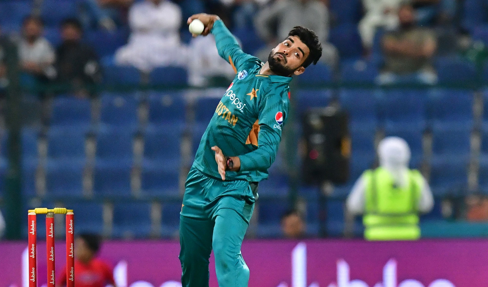 Pakistan's cricketer Shadab Khan bowls during the first T20 cricket match between Pakistan and New Zealand at the Abu Dhabi Cricket Stadium in Abu Dhabi on Oct. 31, 2018. (AFP/File)