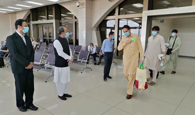 In this file photo, Pakistani expats are seen at Jeddah’s King Abdulaziz International Airport prior to their flight to Karachi on May 31, 2020. (Photo courtesy: Pakistan Consulate General in Jeddah)