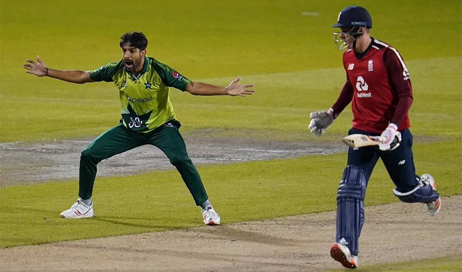 Pakistan's Haris Rauf (L) celebrates the dismissal of England's Tom Banton during the international Twenty20 cricket match between England and Pakistan at Old Trafford cricket ground in Manchester, north-west England, on September 1, 2020. (AFP)