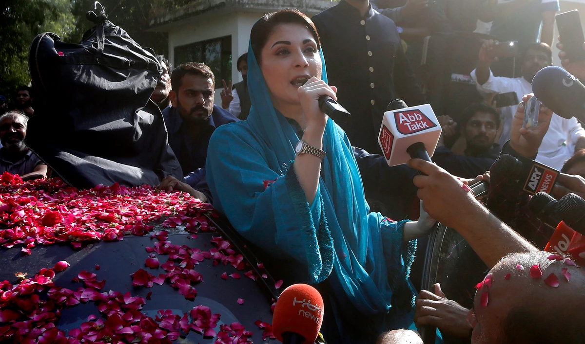 Maryam Nawaz, daughter of former Pakistani Prime Minister Nawaz Sharif and leader of an opposition party, addresses supporters while leaving her home to attend a rally in Lahore on Oct. 16, 2020. (AP)