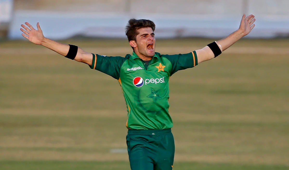Pakistani pacer Shaheen Afridi celebrates after taking the wicket of Zimbabwe's batsman Chamu Chibhabha during their 1st one-day international cricket match against Zimbabwe at the Pindi Cricket Stadium, in Rawalpindi on Oct. 30, 2020. (AP)