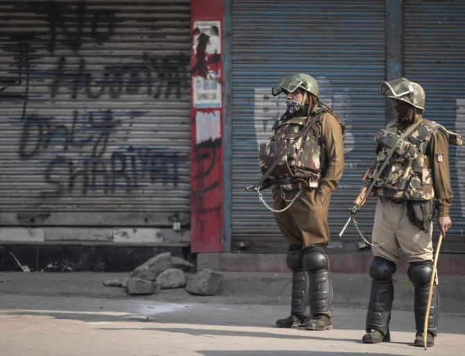 Indian paramilitary soldiers stand guard at a closed market area during a strike called by separatists in Srinagar, Indian controlled Kashmir, Saturday, Oct. 31, 2020. (AP)