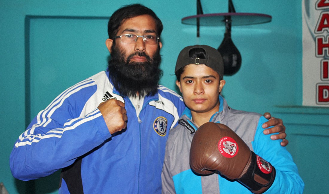 Fifteen-year-old Malaika Zahid poses with her father Muhammad Zahid at a training room at their home in Quetta, Pakistan, on October 29, 2020. (AN photo by Saadullah Akhter)