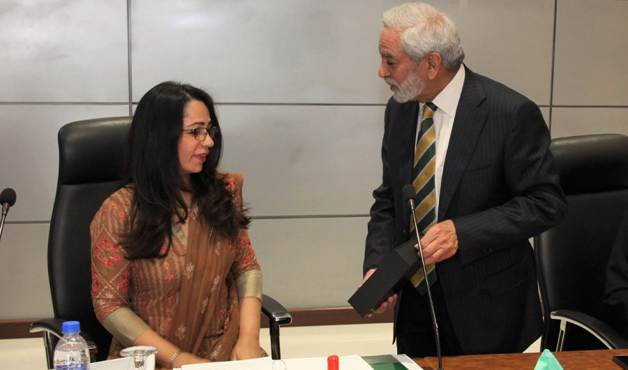 Newly appointed first female director of Pakistan Cricket Board (PCB) Alia Zafar speaking with PCB chairman Ehsan Mani during 60th BoG meeting at the NHPC in Lahore on November 10, 2020. (Photo Courtesy: PCB twitter)