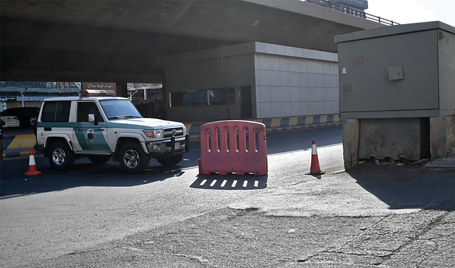 Saudi police close a street leading to a non-Muslim cemetery in Jeddah where a blast, on Nov. 11, 2020. (AFP)