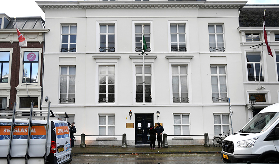Dutch police are seen outside Saudi Arabia's embassy in The Hague, Netherlands, Thursday, Nov. 12, 2020, after several shot were fired at the building early in the morning. Nobody was injured and police were investigating. (AP)