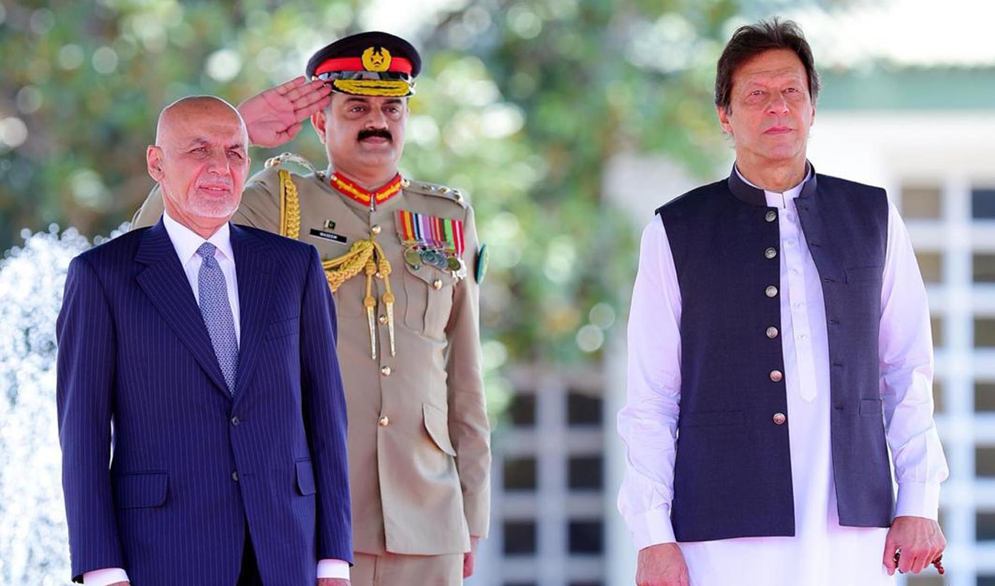 Pakistan's prime minister Imran Khan and Afghan president Ashraf Ghani can be seen together during the Guard of Honor ceremony in Islamabad on 27th June, 2019. (PID/File)
