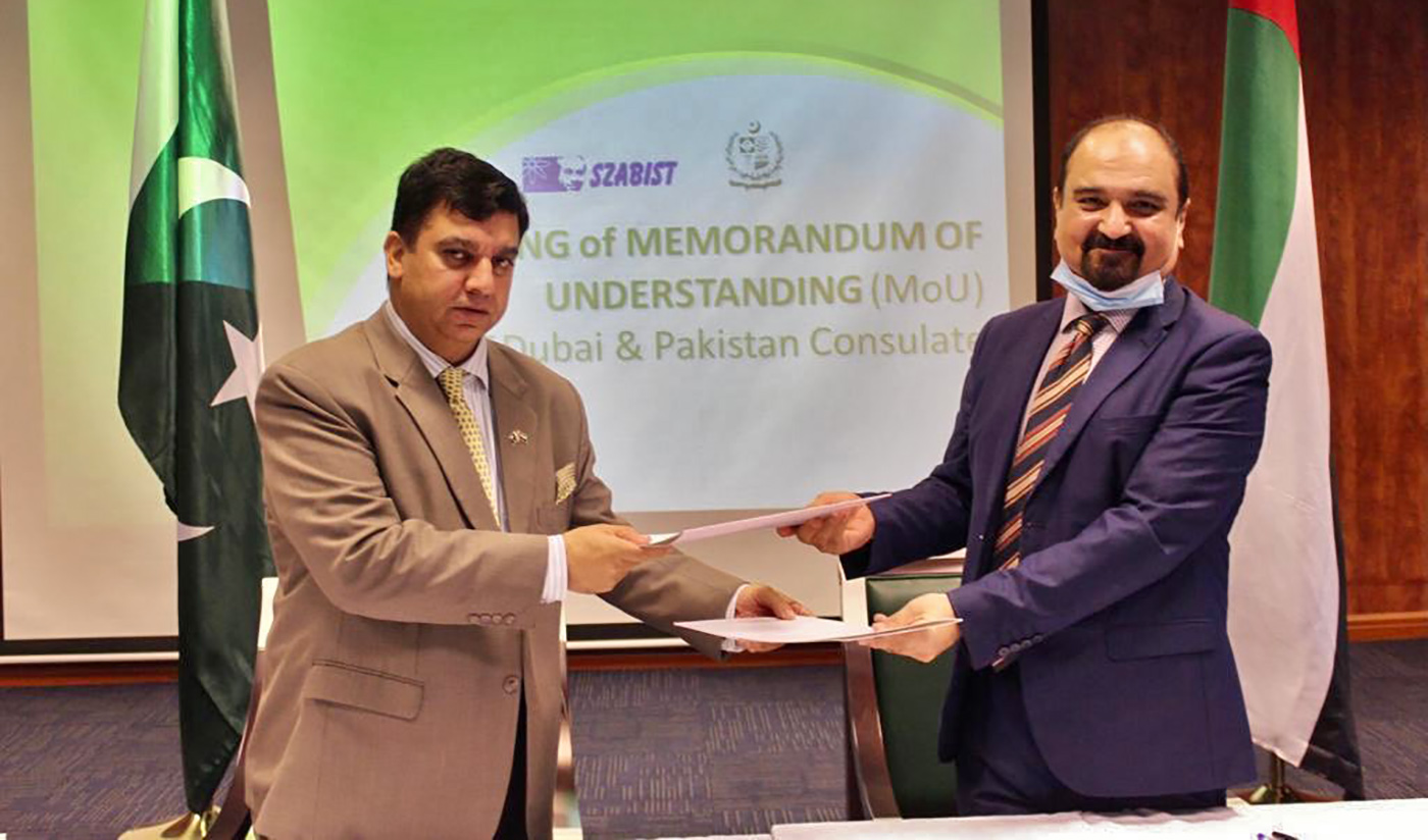 Consul General of Pakistan to Dubai, Ahmed Amjad Ali, center left, with the staff of Skyline University College, Sharjah, after signing a Memorandum of Understanding on Nov. 16, 2020 (Photo courtesy: @ParepDubai/Twitter)