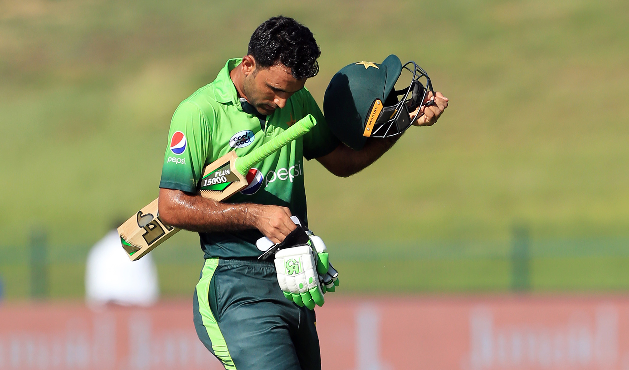 Pakistan's Fakhar Zaman leaves the field after being dismissed by Sri Lank's Kusal Mendis during the second one day international (ODI) cricket match between Sri Lanka and Pakistan at Sheikh Zayed Stadium in Abu Dhabi on Oct. 16, 2017. (AFP/File)