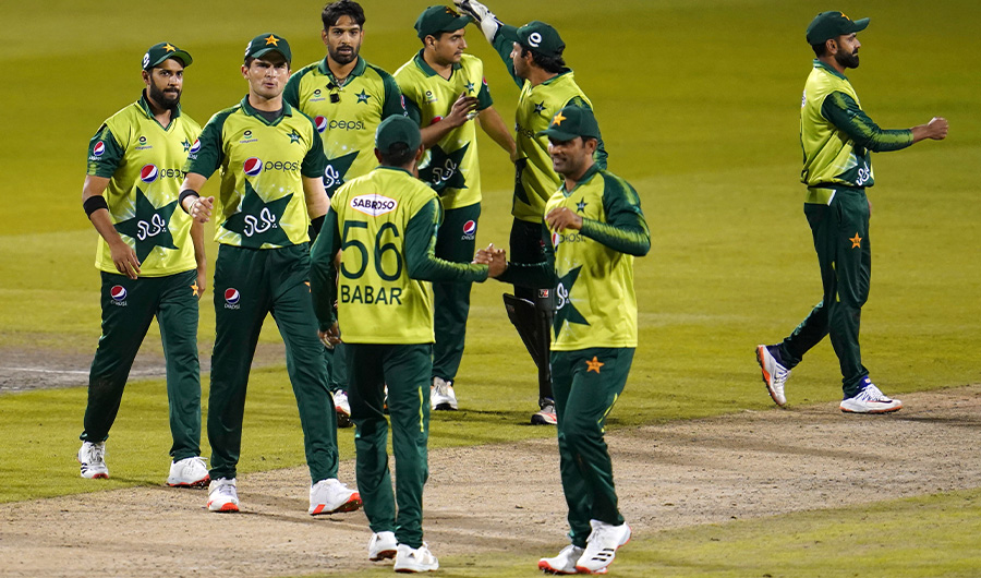FILE - In this Tuesday Sept. 1, 2020, file photo, Pakistan players celebrate their win in the third Twenty20 cricket match against England at Old Trafford in Manchester, England. Six members of the Pakistan cricket squad in New Zealand have tested positive, Thursday Nov. 26, 2020 for COVID-19 and have been moved from managed isolation into quarantine. (AP Photo/ File)