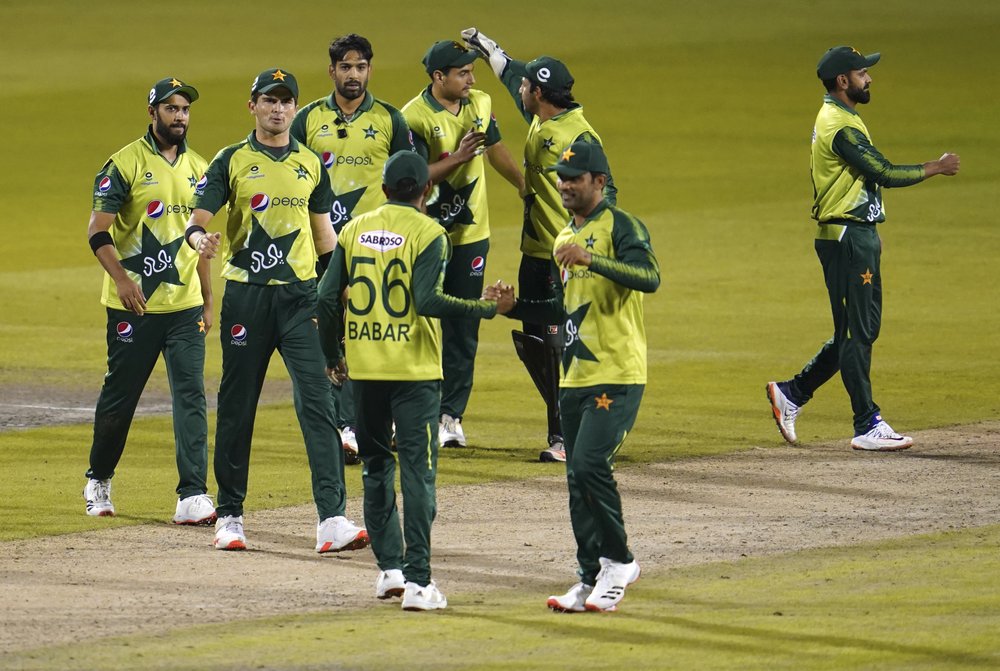 FILE - In this Tuesday Sept. 1, 2020, file photo, Pakistan players celebrate their win in the third Twenty20 cricket match against England at Old Trafford in Manchester, England. Six members of the Pakistan cricket squad in New Zealand have tested positive, Thursday Nov. 26, 2020 for COVID-19 and have been moved from managed isolation into quarantine. (AP)