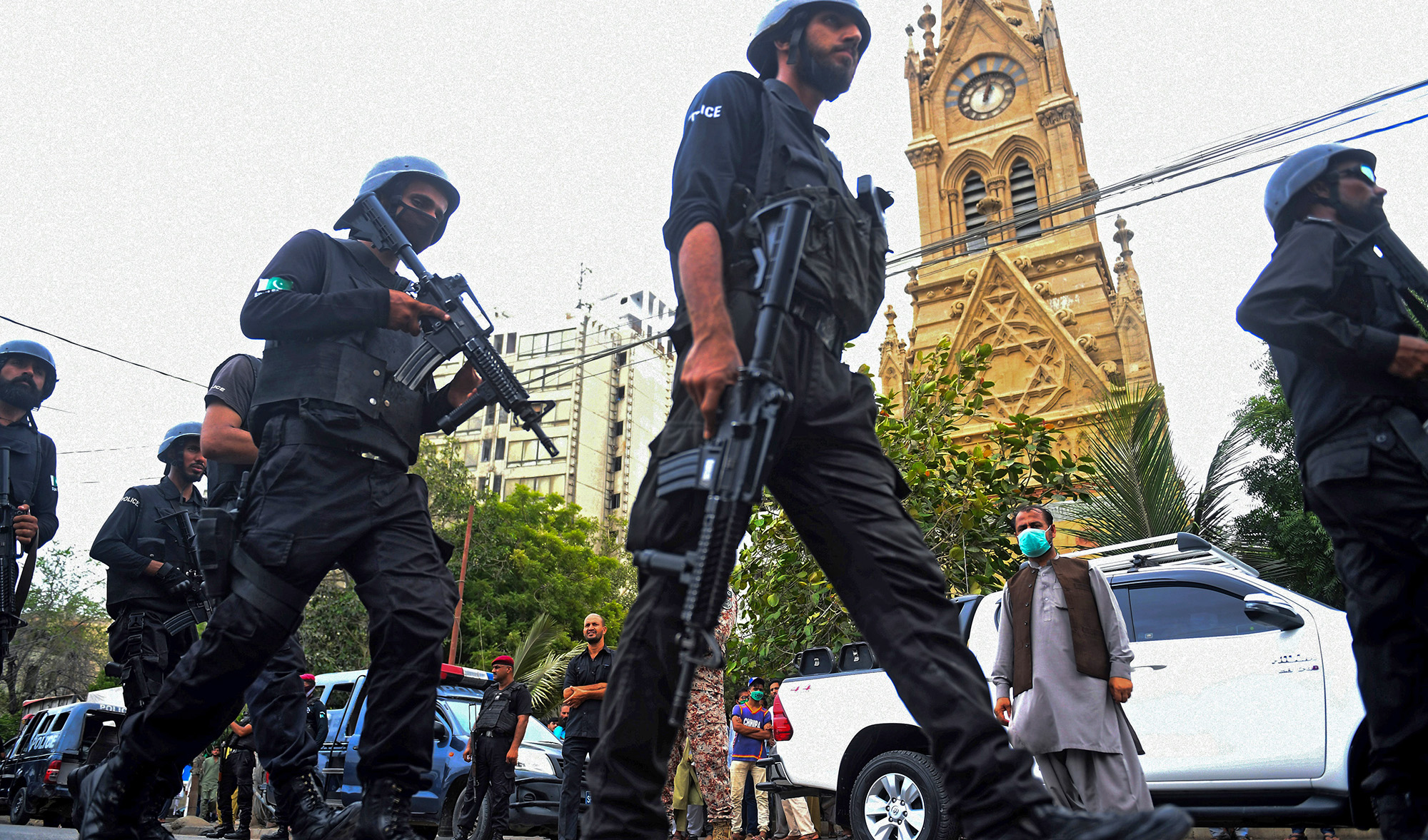 Police commandos patrol near the Pakistan Stock Exchange building in Karachi on June 29, 2020. (AFP/File)