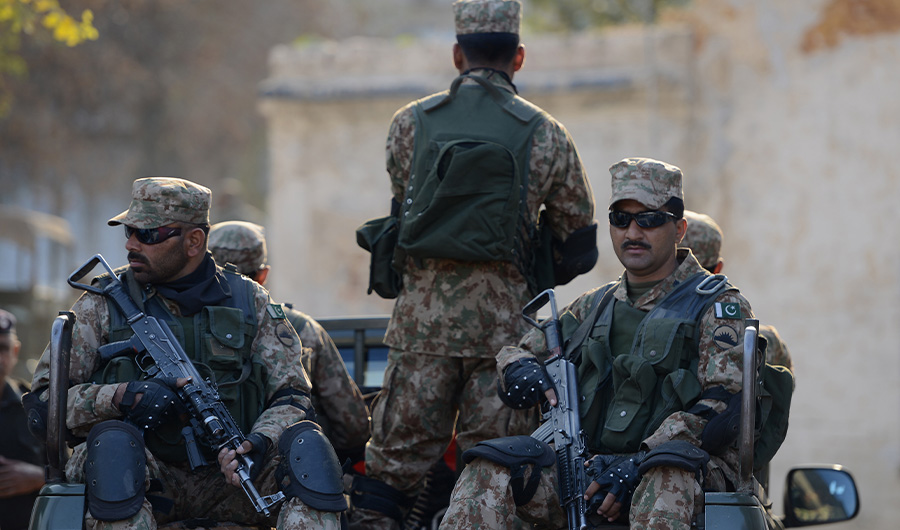 Pakistani army soldiers patrol in Rawalpindi on December 24, 2013. (AFP)