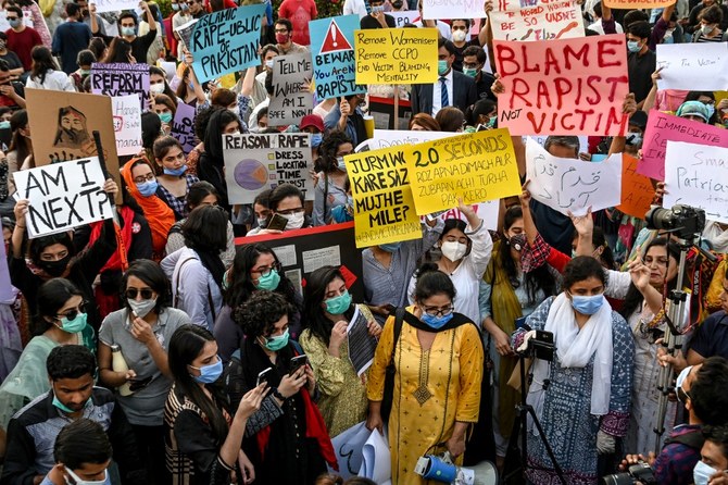 Hundreds of protesters take to the streets of Lahore across Pakistan on Sept. 12, 2020 protesting gruesome gang rape of a woman in front of her two children after her car ran out of fuel near the city on Sept. 9. (AFP)