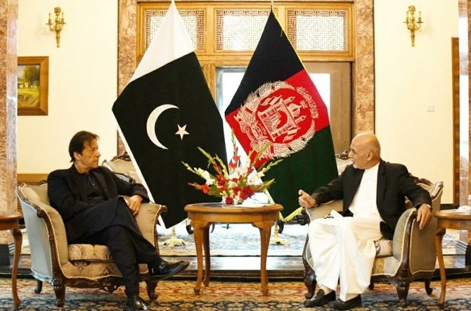 FILE - Pakistan's Prime Minister Imran Khan (L) and Afghan President Ashraf Ghani attend their meeting at the Presidential Palace in Kabul on November 19, 2020. (Photo courtesy: Pakistan's PM Office)