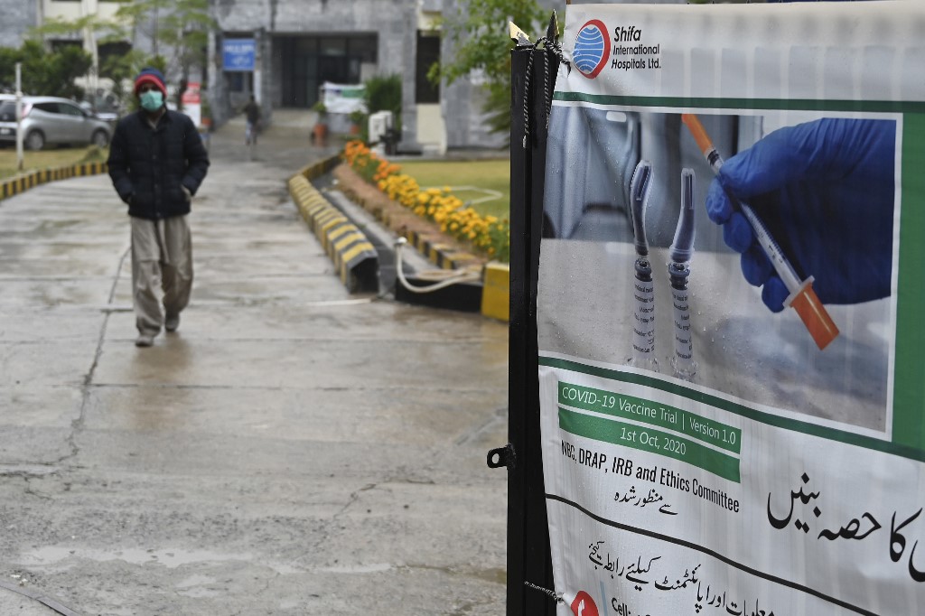 In this picture taken on November 25, 2020 a Pakistani volunteer leaves after being administered a Chinese-made vaccine for the COVID-19 coronavirus at a hospital in Islamabad. (AFP/File)