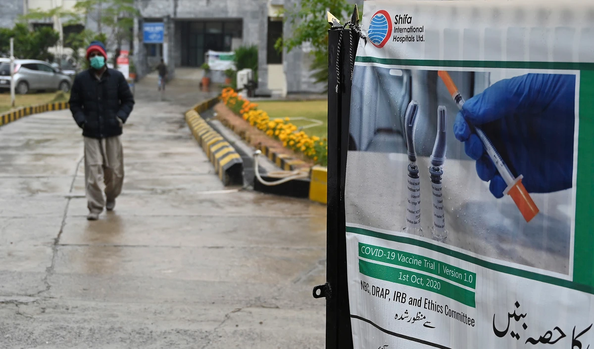In this picture taken on November 25, 2020 a volunteer leaves after being administered the new Chinese-made vaccine for the Covid-19 coronavirus, the first ever Phase 3 clinical trial for any vaccine in Pakistan, at a hospital in Islamabad. (AFP/File)