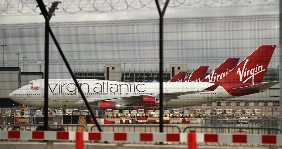Virgin Atlantic Airline planes are pictured at the apron at Manchester Airport in north-west England, on June 8, 2020. (AFP)